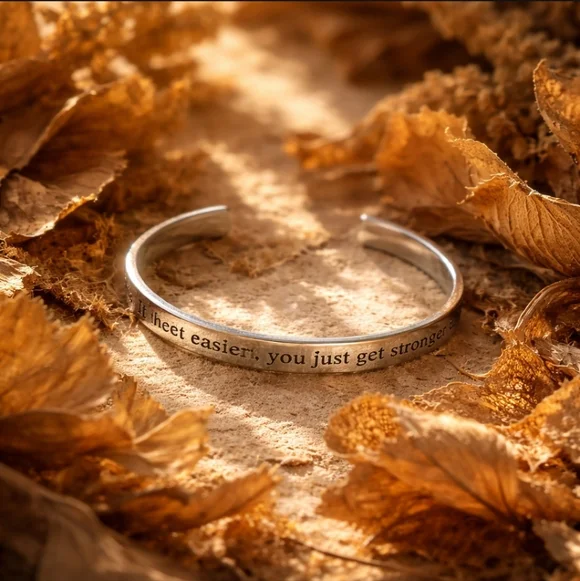 Silver Inspirational Bracelet "It never gets easier, you just get stronger" - Picture 2 of 5